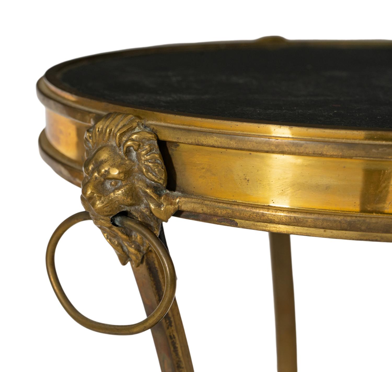 An Empire Style Brass Mounted Gueridon Table