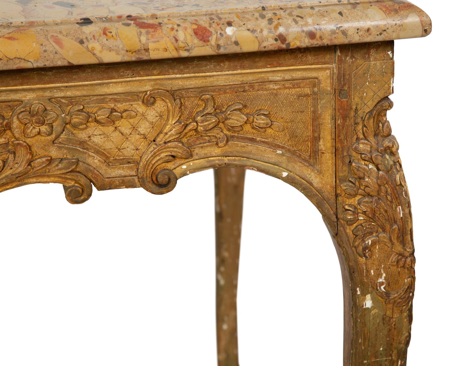 A Louis XV Giltwood Marble Top Side Table — CIRCA 1725