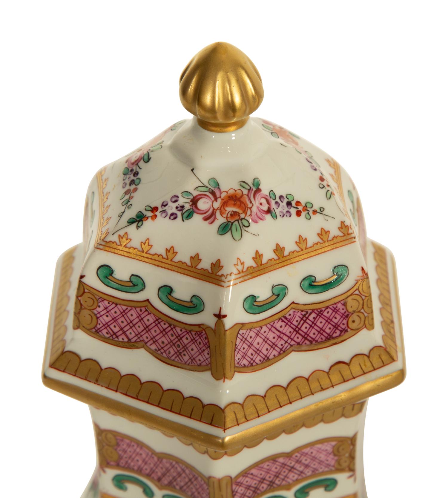 A Pair of Porcelaine de Paris Covered Vases