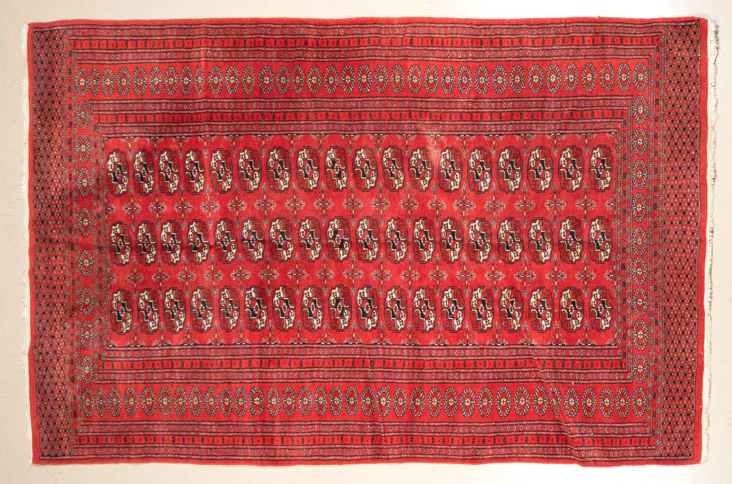 A Bohkara Wool Rug 6 feet 4 1/2 inches x 4 feet 1 1/2 inches.