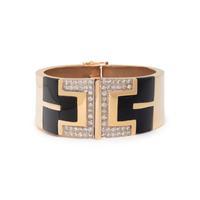 YELLOW GOLD, ONYX, AND DIAMOND HINGED BANGLE BRACELET