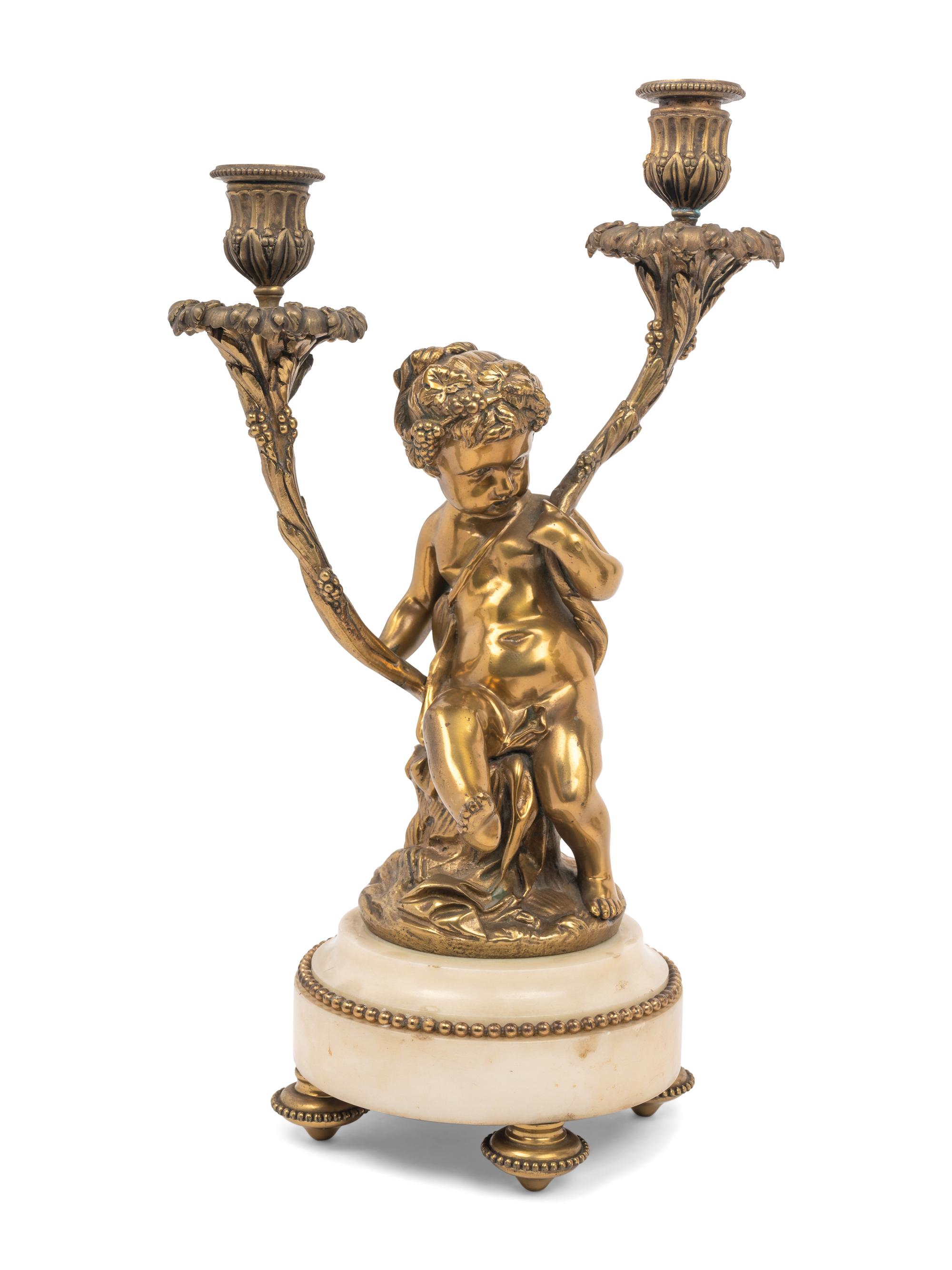 A Pair of French Gilt Bronze and Marble Figural Two-Light Candelabra