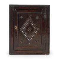 A Charles II Oak Hanging Cabinet
