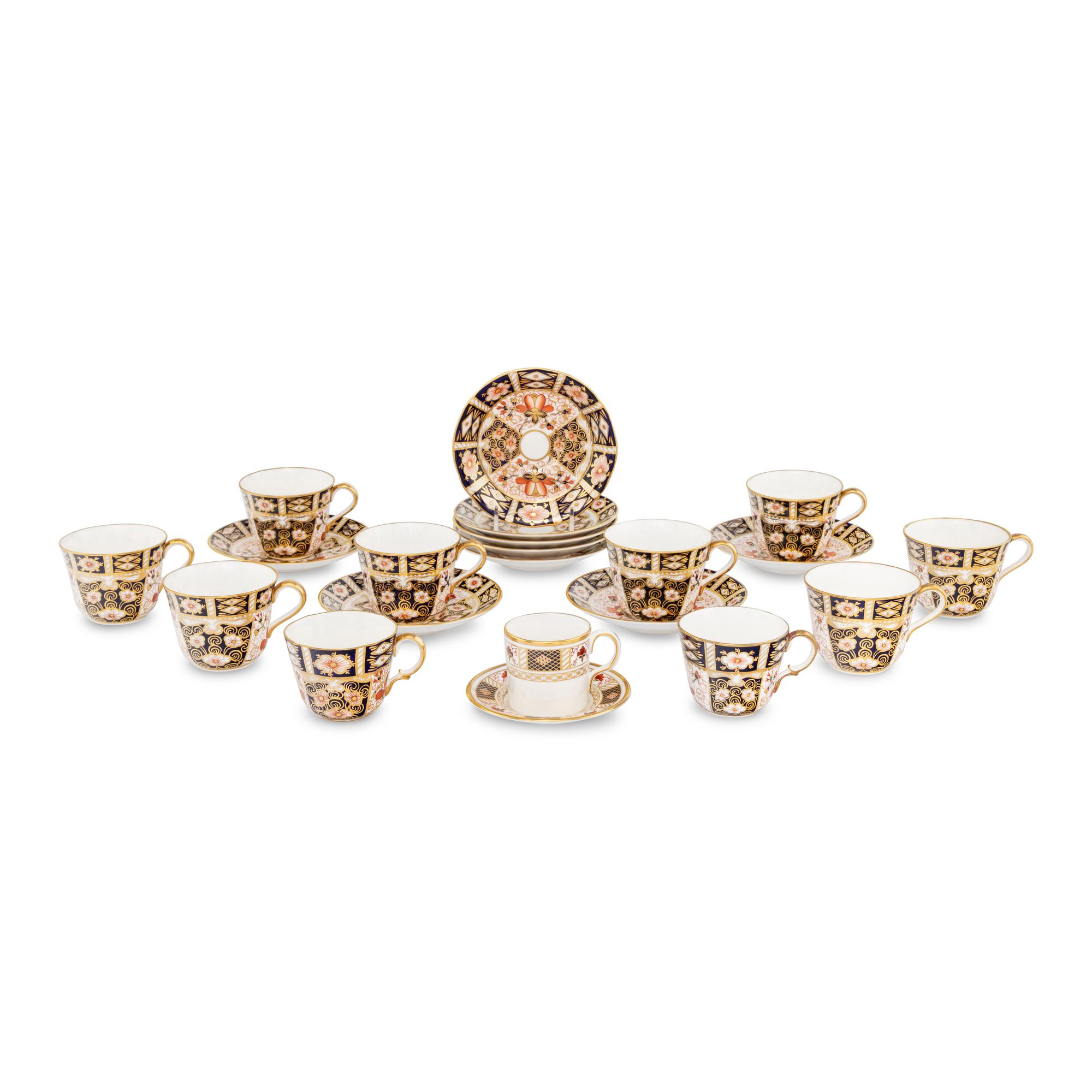 A Group of Royal Crown Derby Porcelain Teacups and Saucers