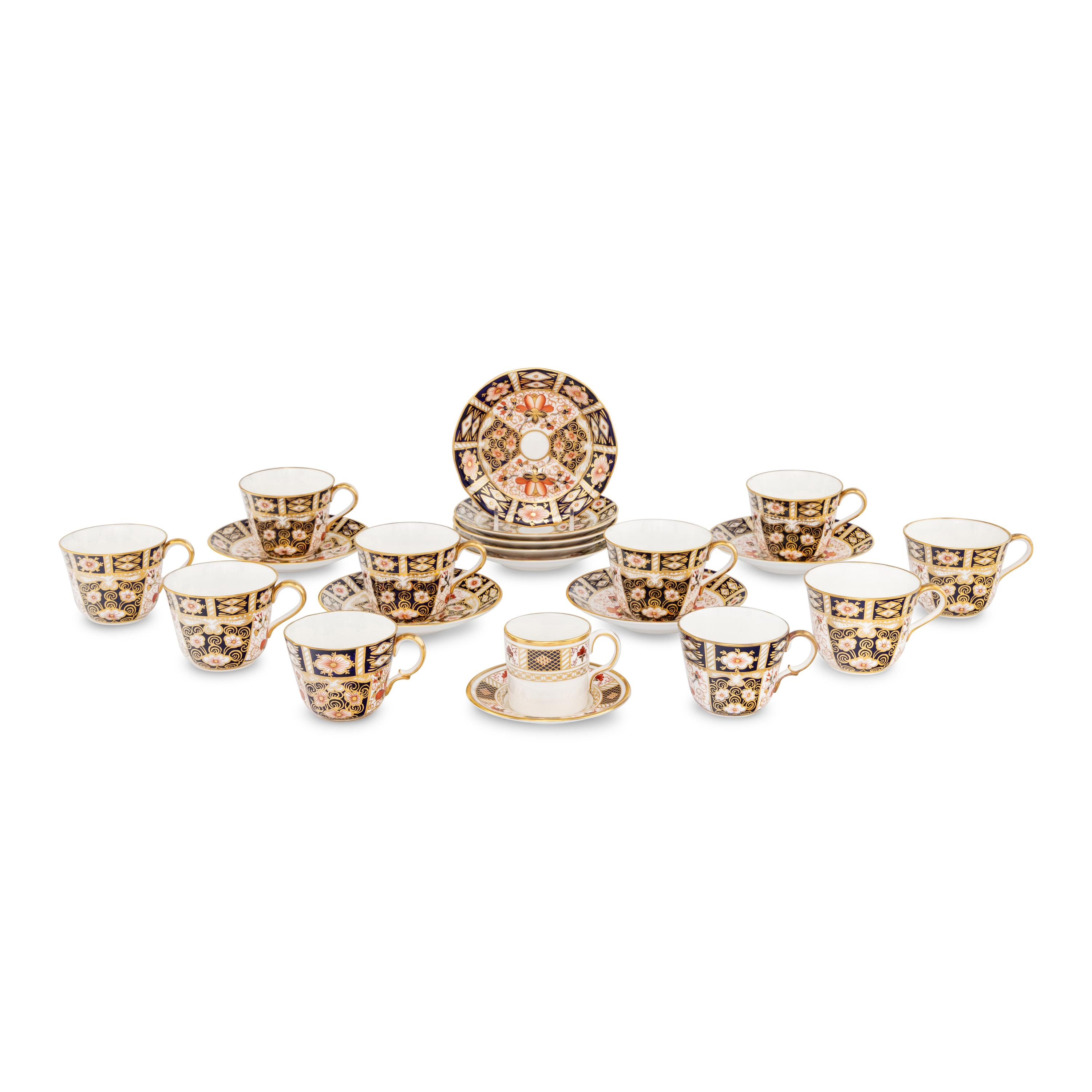 A Group of Royal Crown Derby Porcelain Teacups and Saucers