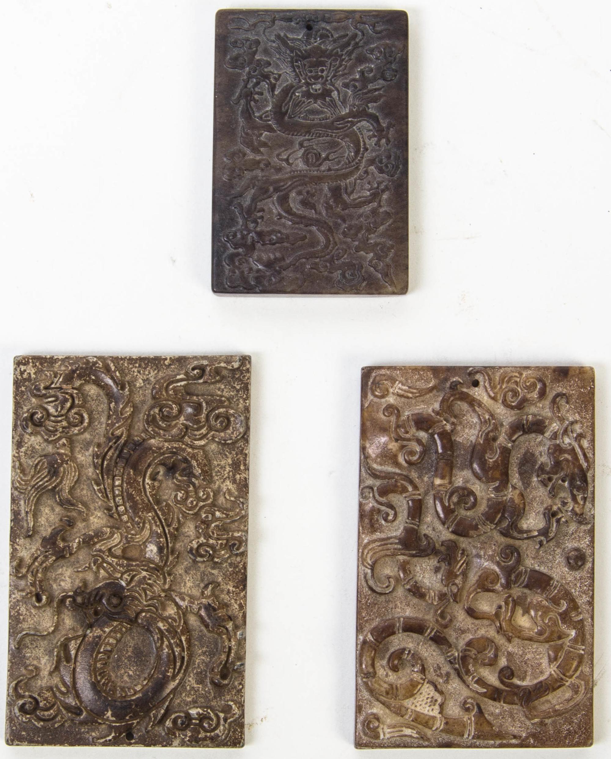 Three Carved Stone Plaques Height of first 3 1/2 inches.