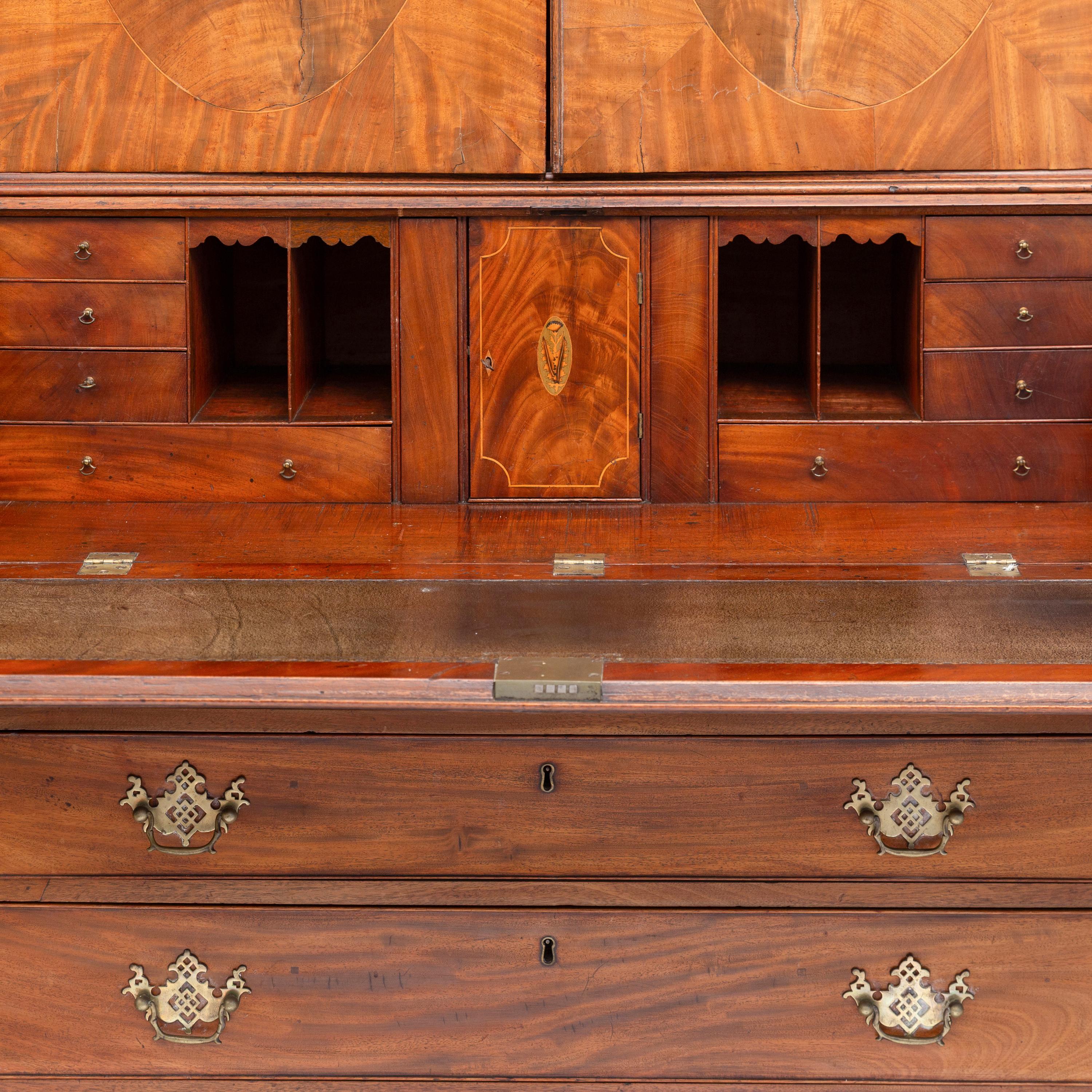 A George III Figured Mahogany Bureau Cabinet