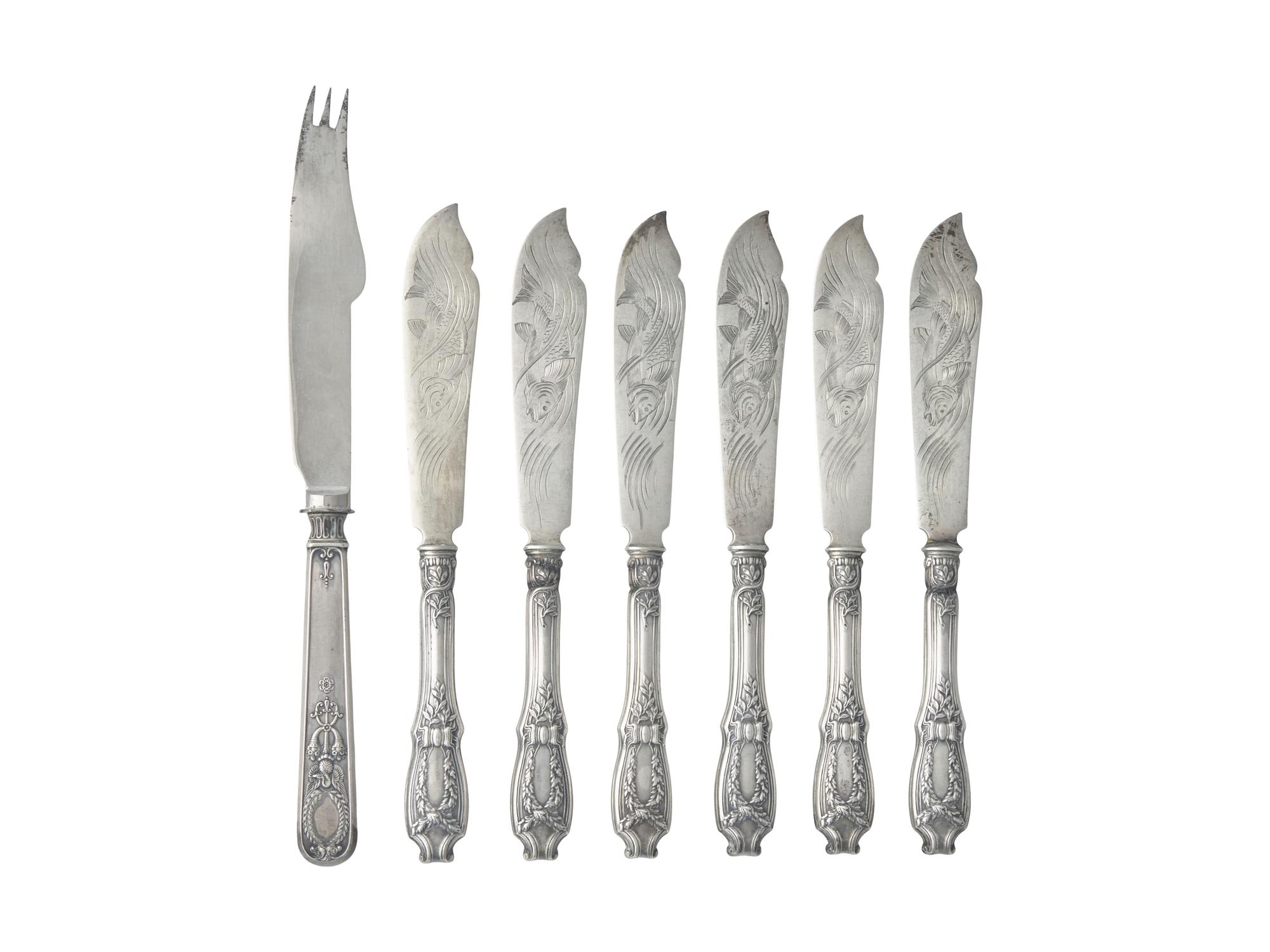 A Set of Six Russian Silver Fish Knives and a Single Russian Silver Knife