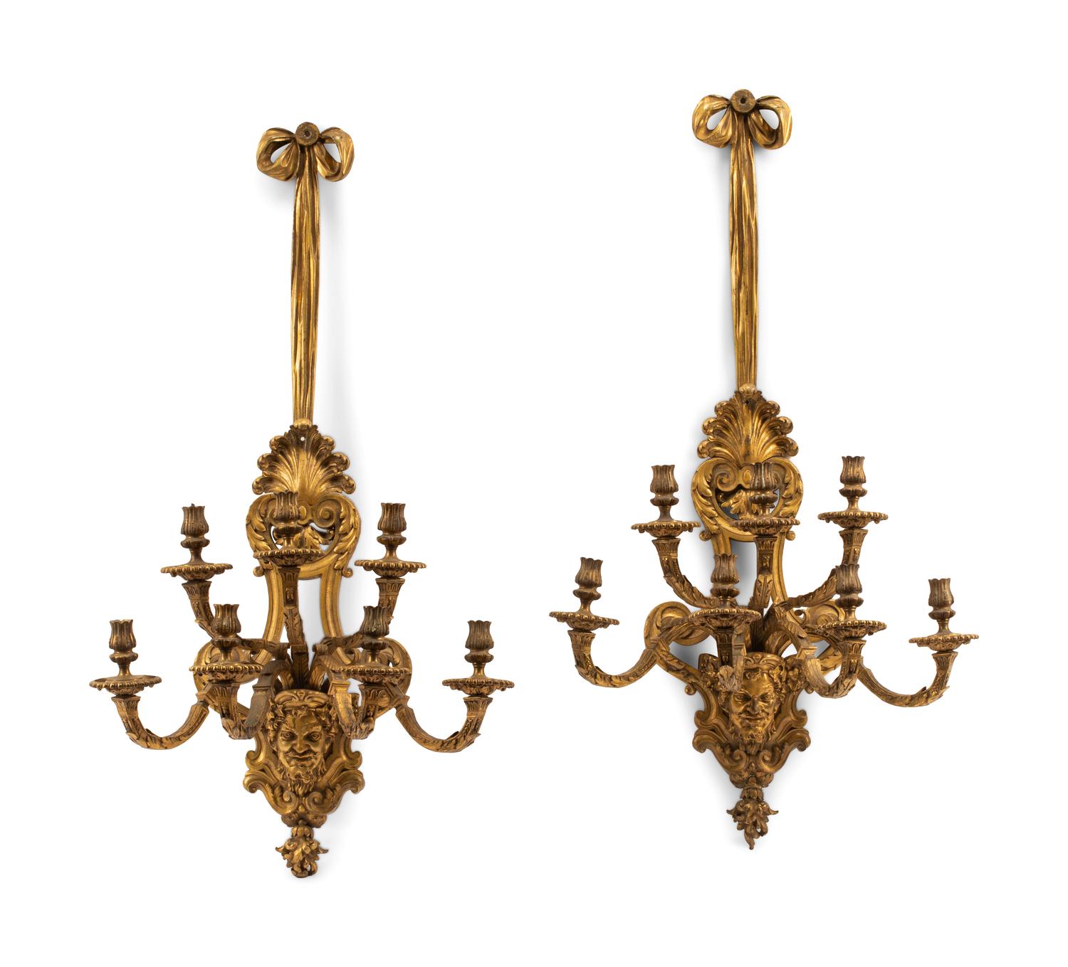 A Pair of Régence Style Gilt Bronze Seven-Light Sconces