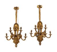 A Pair of Régence Style Gilt Bronze Seven-Light Sconces