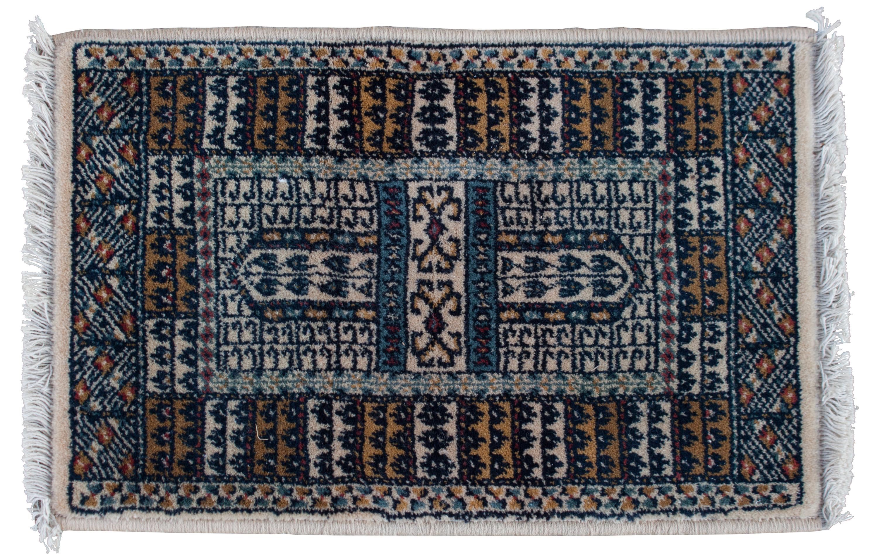 Two Wool Prayer Rugs Largest 2 feet x 1 foot 7 inches.