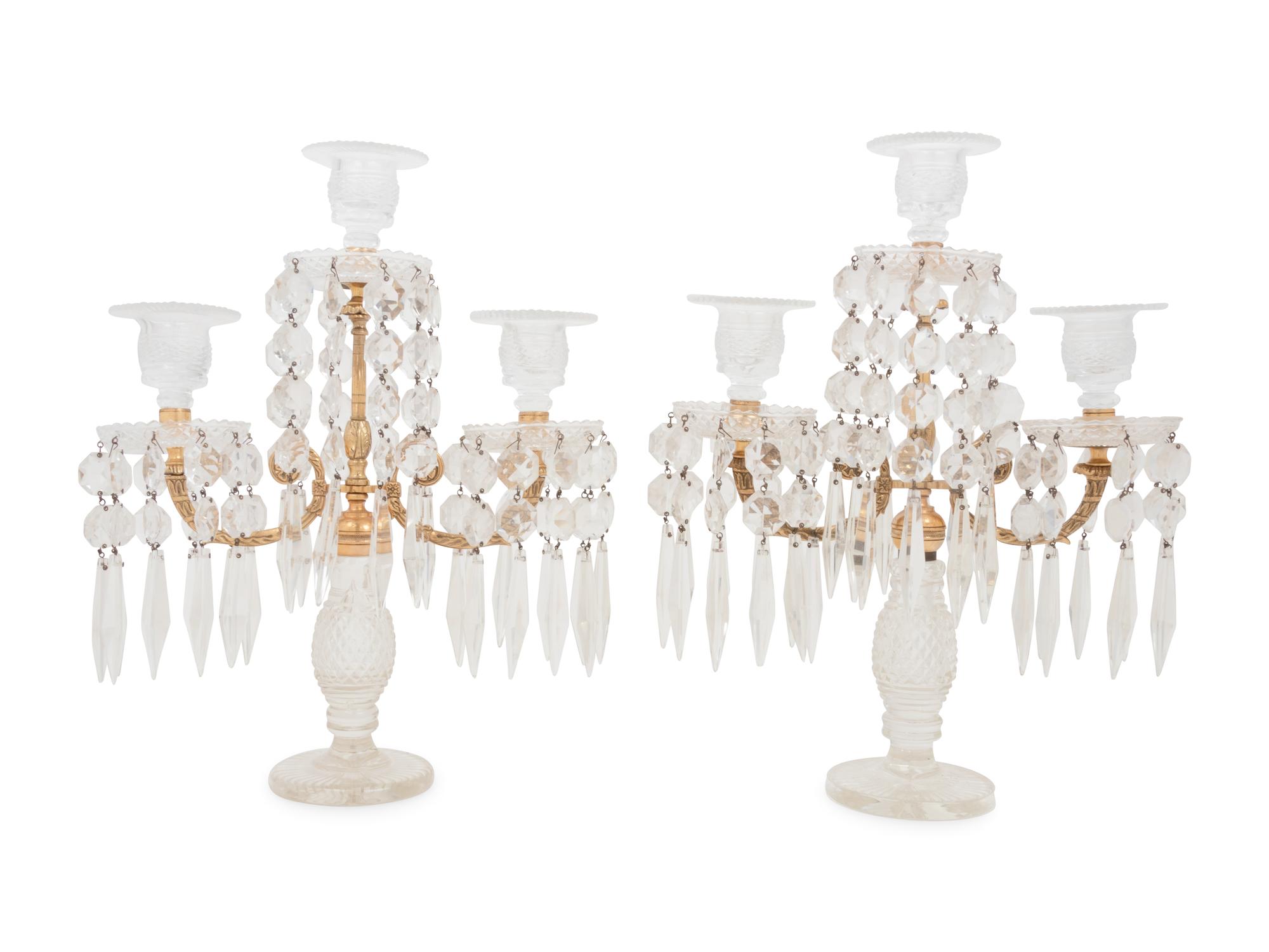 A Pair of French Gilt Bronze and Cut Glass Three-Light Candelabra