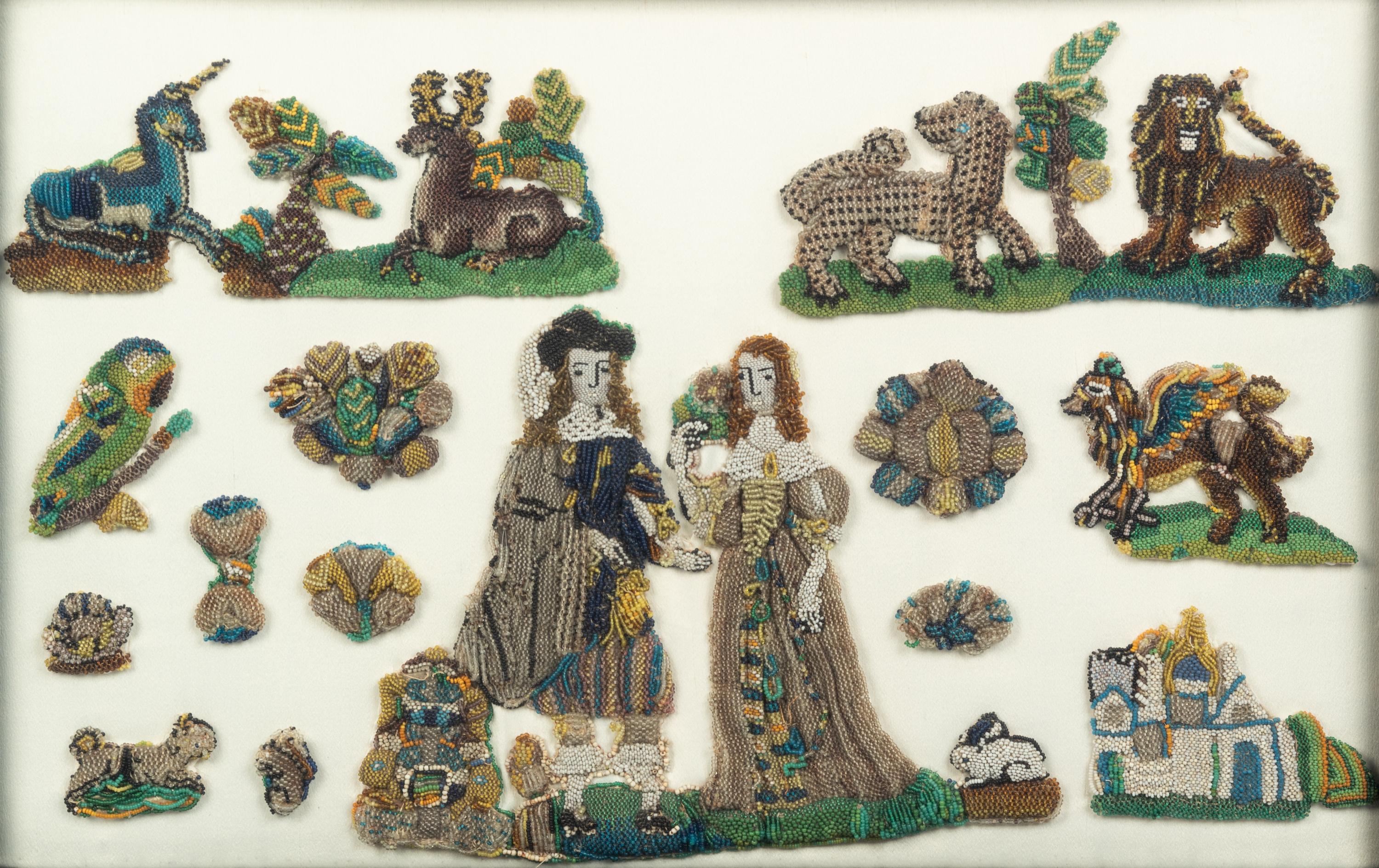 A Group of English Beadworks in a Flemish Tortoise Shell and Ebonized Ripple-Molded Frame