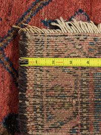 Five Wool Rugs