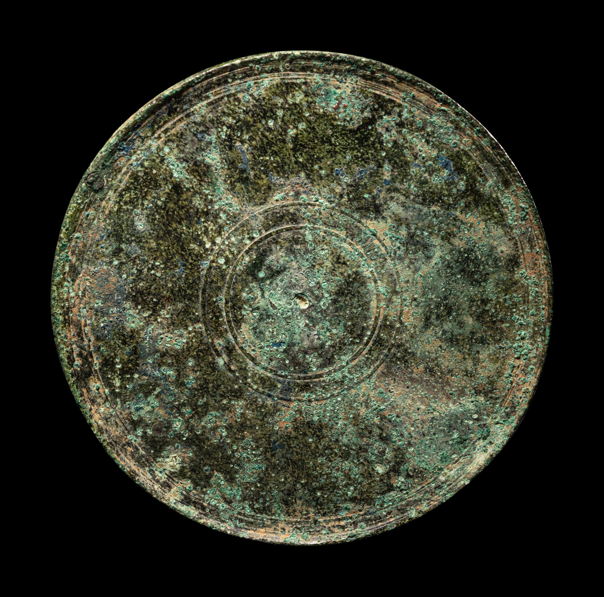 A Greek Bronze Mirror with the Head of a Woman