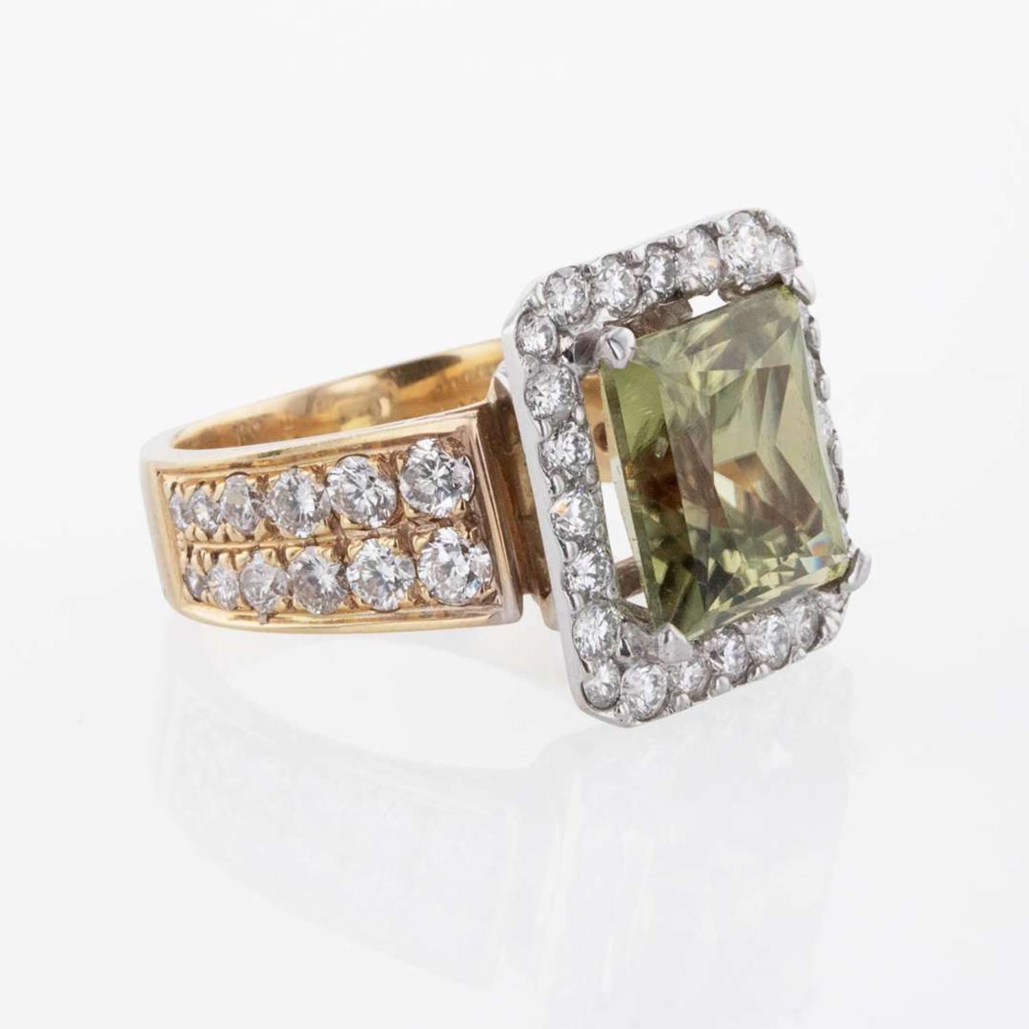 An 18K Gold, Diaspore, and Diamond Ring