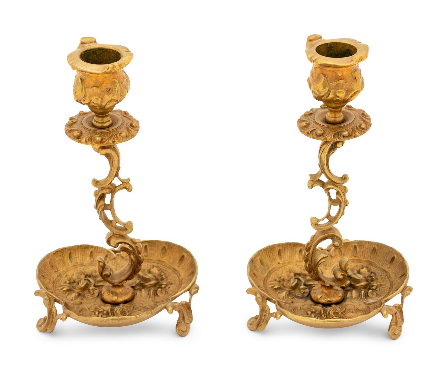 A Group of Continental Brass and Bronze Inkwells and Candlesticks