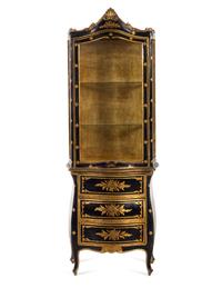 An Italian Parcel Gilt Ebonized Vitrine Cabinet
