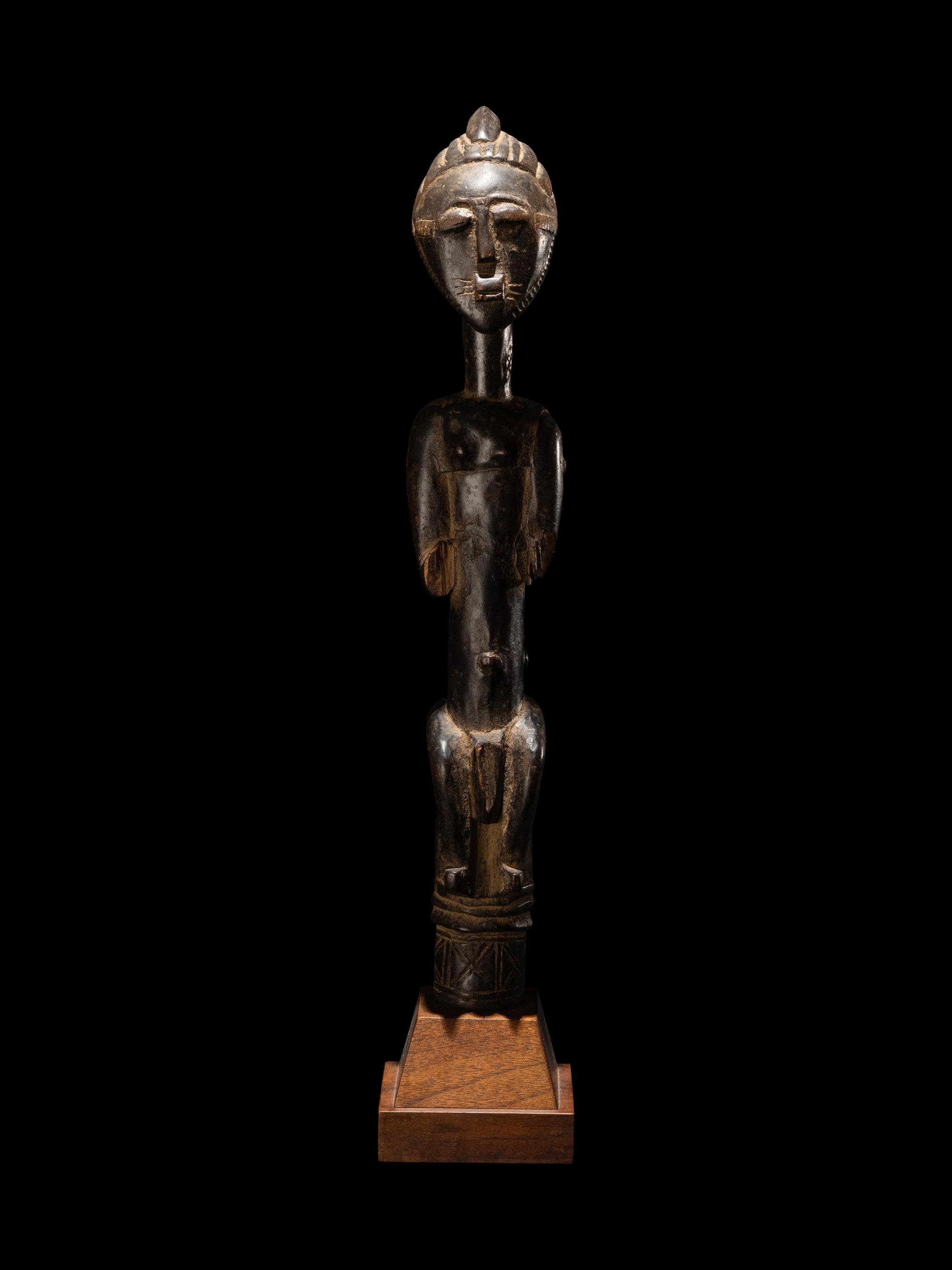 An African Carved Staff Top or Finial