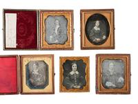 35 sixth plate daguerreotypes featuring women of varying ages.
