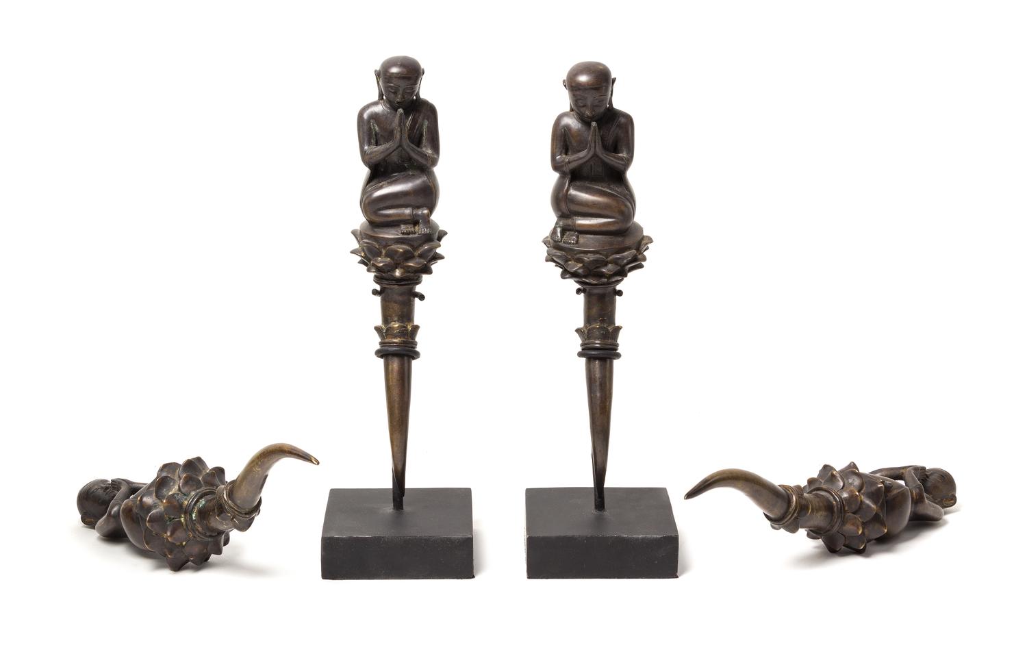 A Group of Four Burmese Bronze Figures Height 13 1/2 inches.