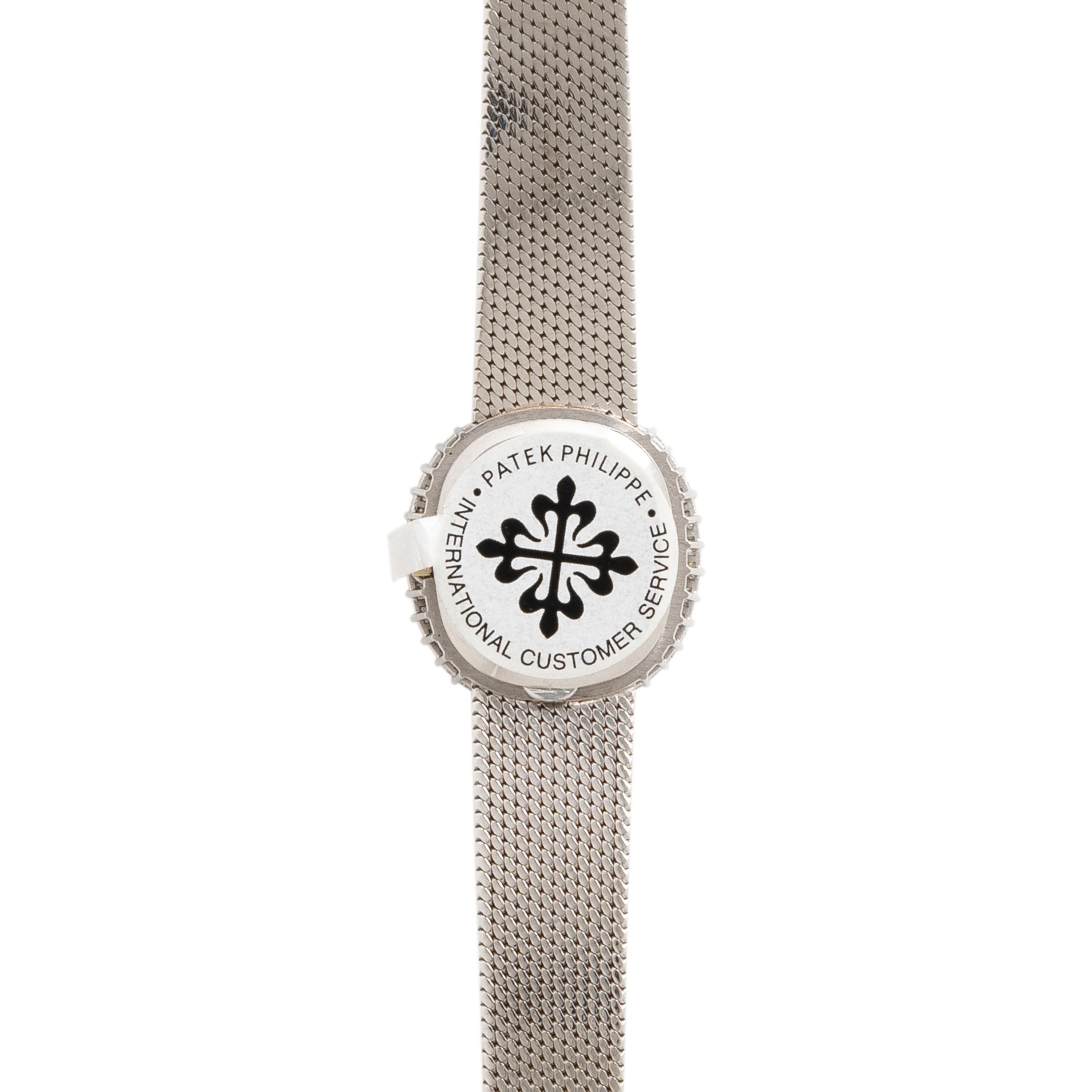 PATEK PHILIPPE, REF. 4138/1 18K WHITE GOLD AND DIAMOND WATCH
