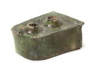 A Chinese Dark Green Glazed Pottery Model of a Stove Length 9 x width 6 3/4 inches. — HAN DYNASTY (206 B.C. - A.D. 220)