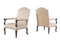 A Set of Four Régence Style Carved Walnut Library Chairs