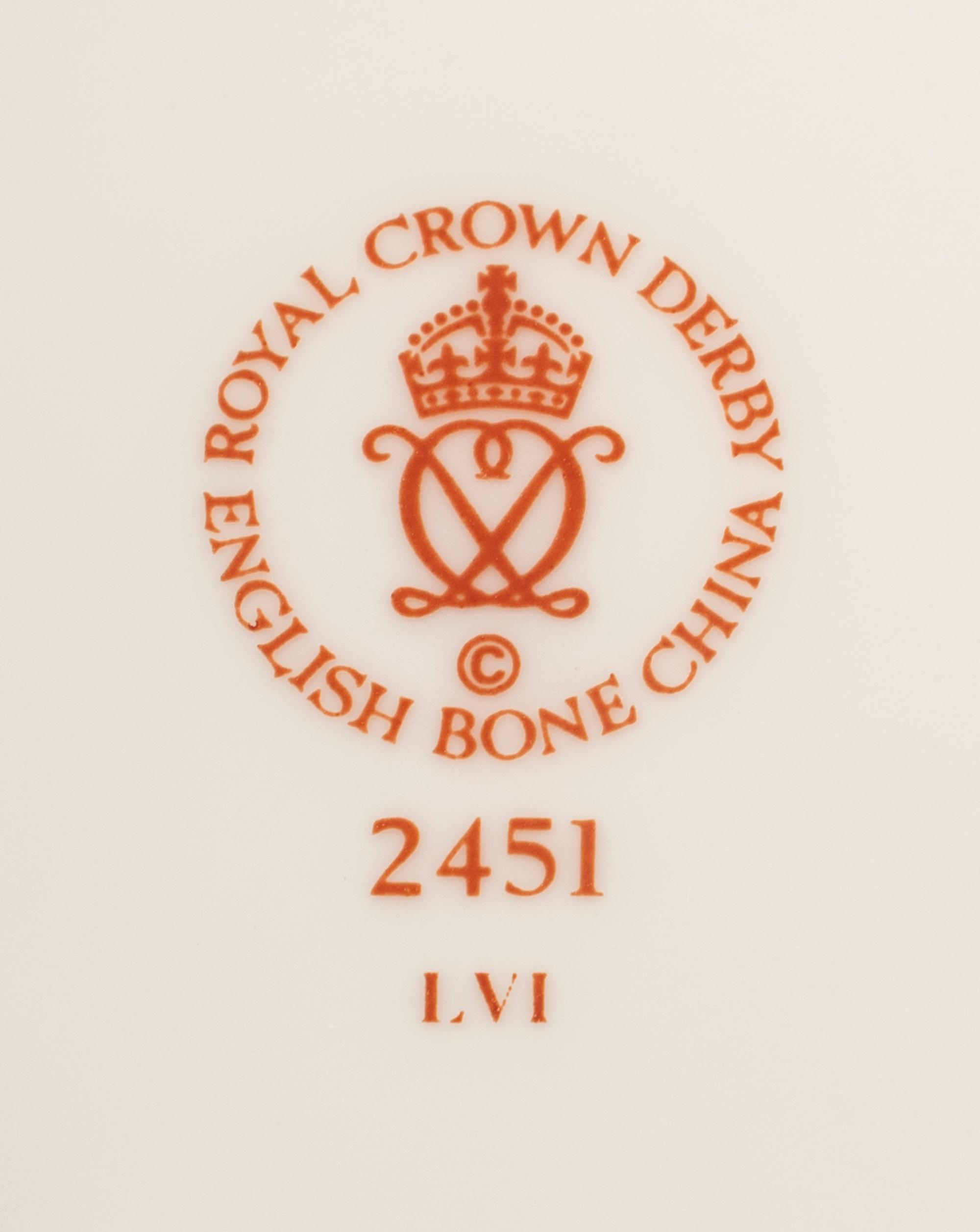 A Royal Crown Derby Porcelain Dinner Service