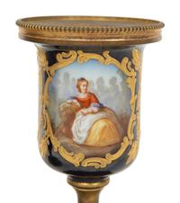 A Pair of Small Sevrés Style Porcelain and Gilt Bronze Urns