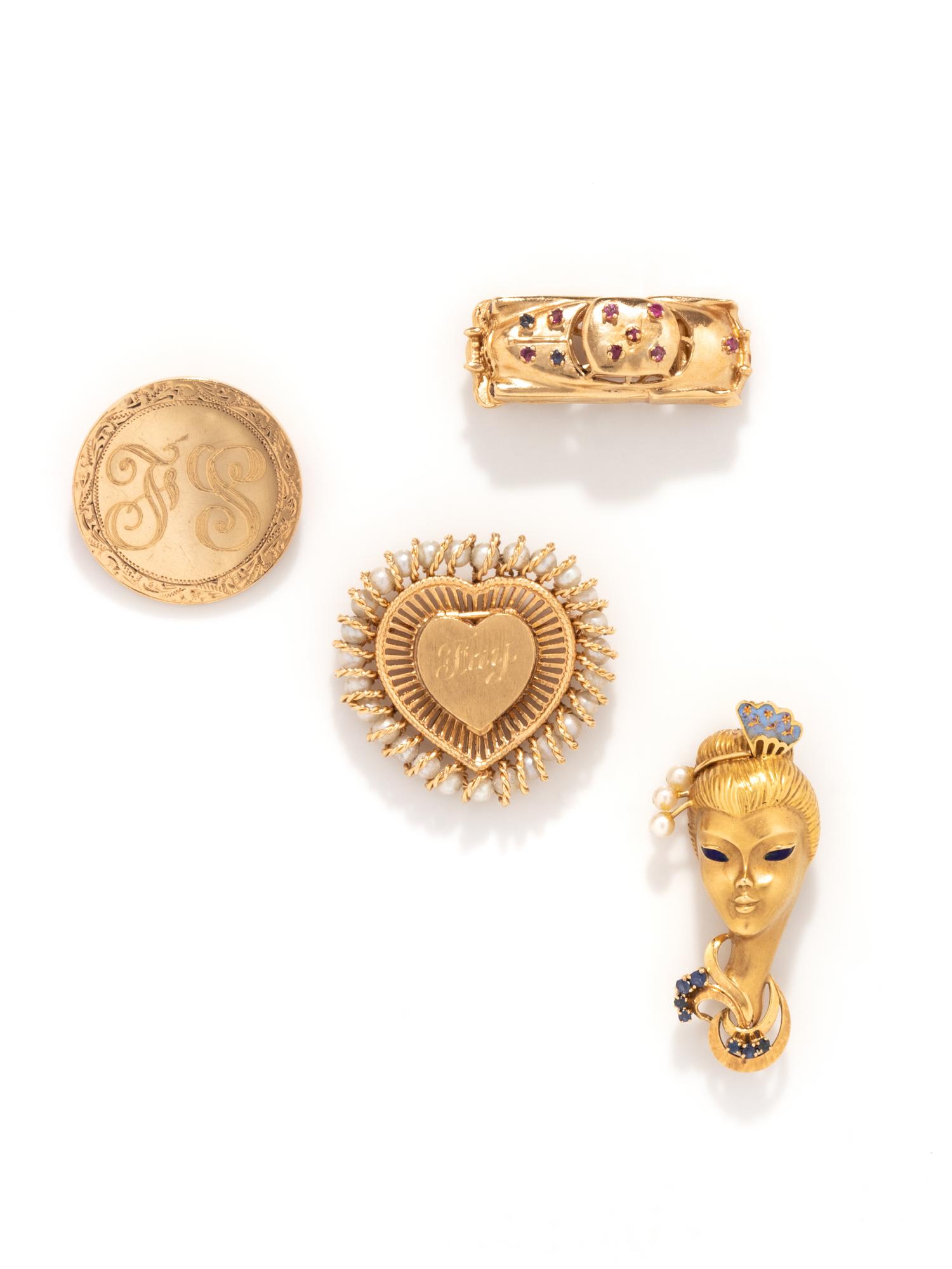 COLLECTION OF YELLOW GOLD BROOCHES
