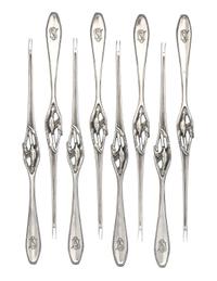 A Set of Eight German Silver Lobster Forks, Bruckmann & Sohne, Heilbronn, Early 20th Century, each having a beaded handle, the neck wor