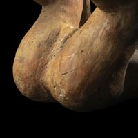 A Jalisco Terracotta Seated Male Figure