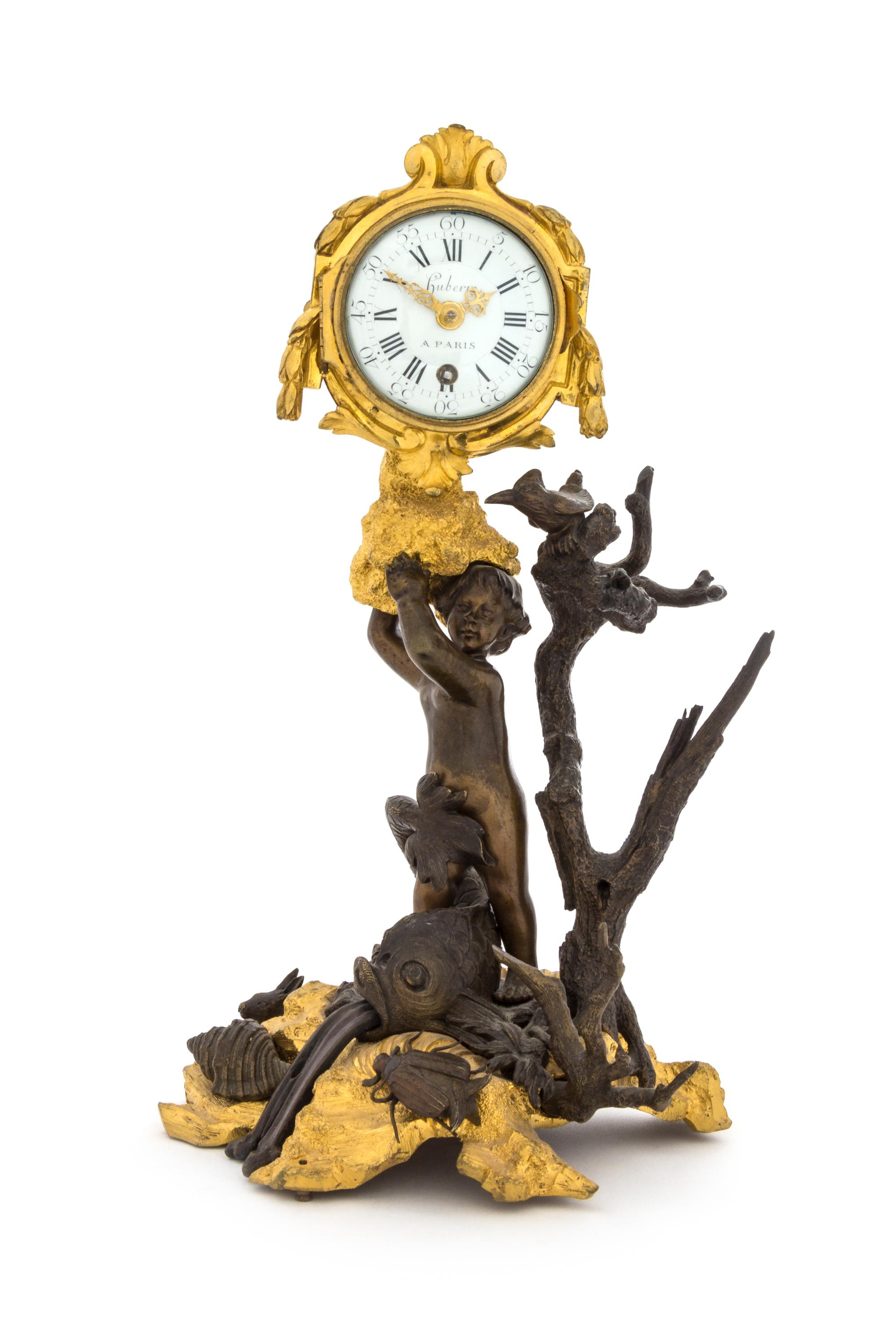 A French Gilt and Patinated Bronze Figural Clock Height 11 1/8 inches. — CIRCA 1790