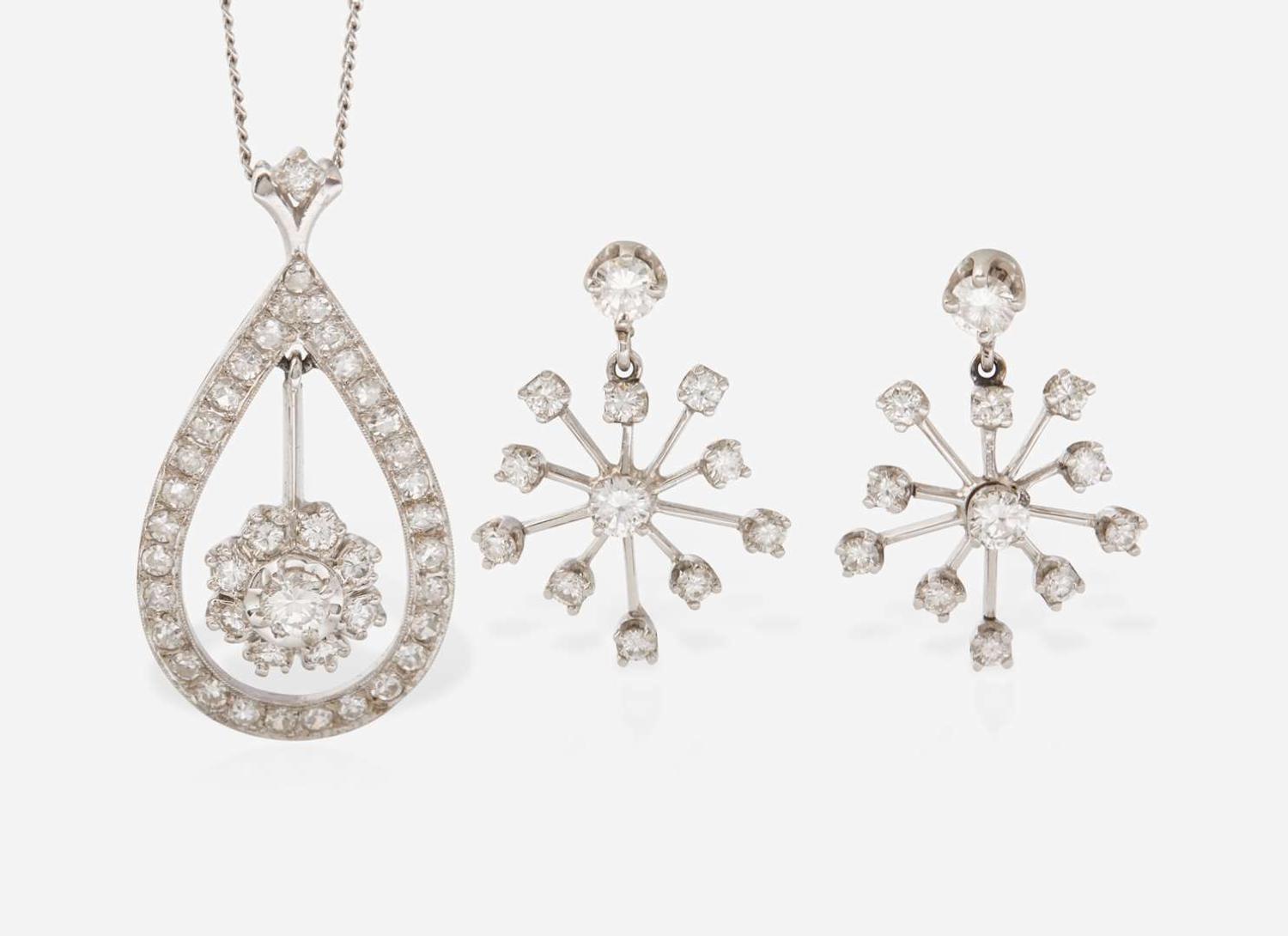 A Set of 14K White Gold and Diamond Earrings and Necklace