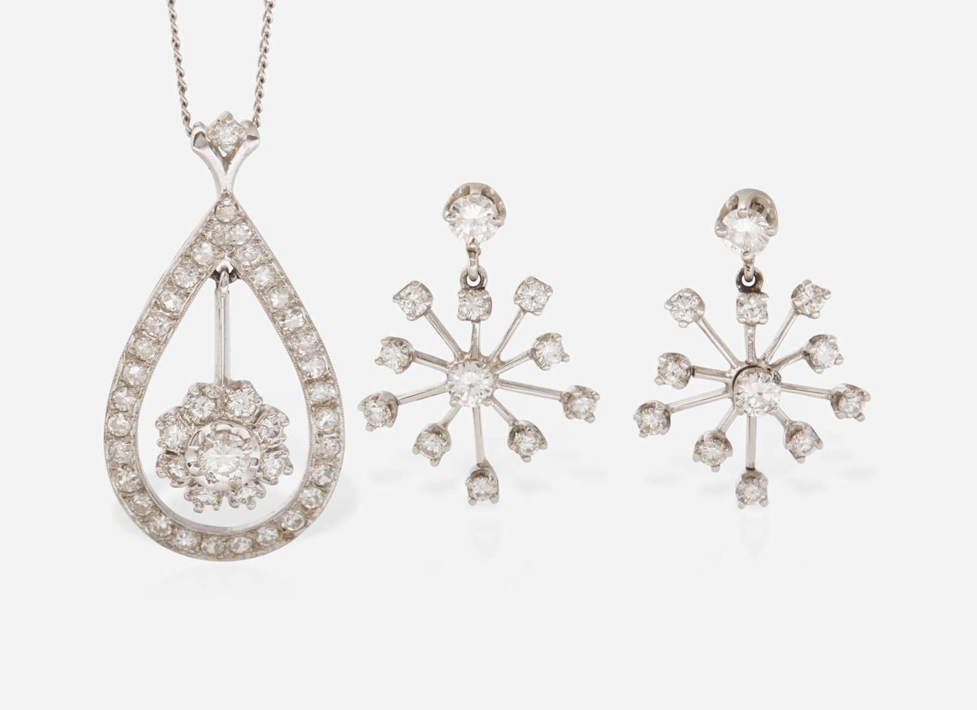 A Set of 14K White Gold and Diamond Earrings and Necklace