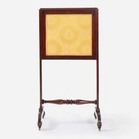 A Regency Ebony String Inlaid Mahogany Fire Screen Writing Table