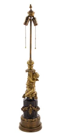 A French Gilt Metal Figural Lamp Height overall 33 inches. — 20TH CENTURY