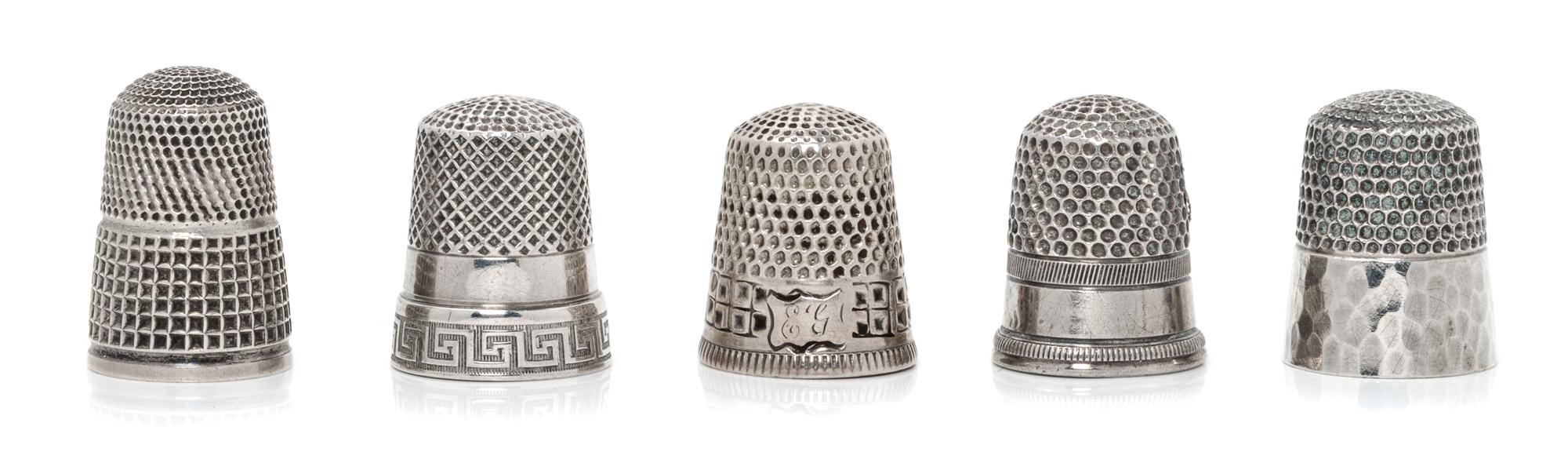 Five American Silver Thimbles, Various Makers, comprising an example having a Greek meander decorated rim, Webster Co., North Attleboro