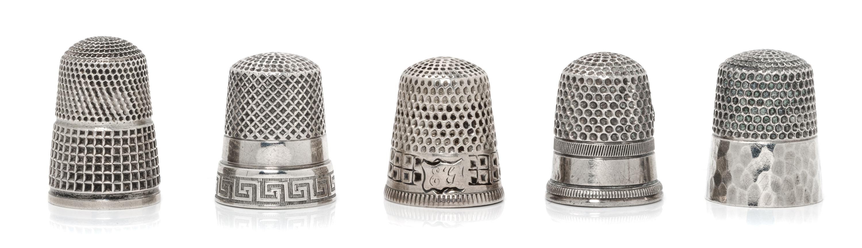 Five American Silver Thimbles, Various Makers, comprising an example having a Greek meander decorated rim, Webster Co., North Attleboro