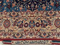 A Signed Isfahan Silk Rug