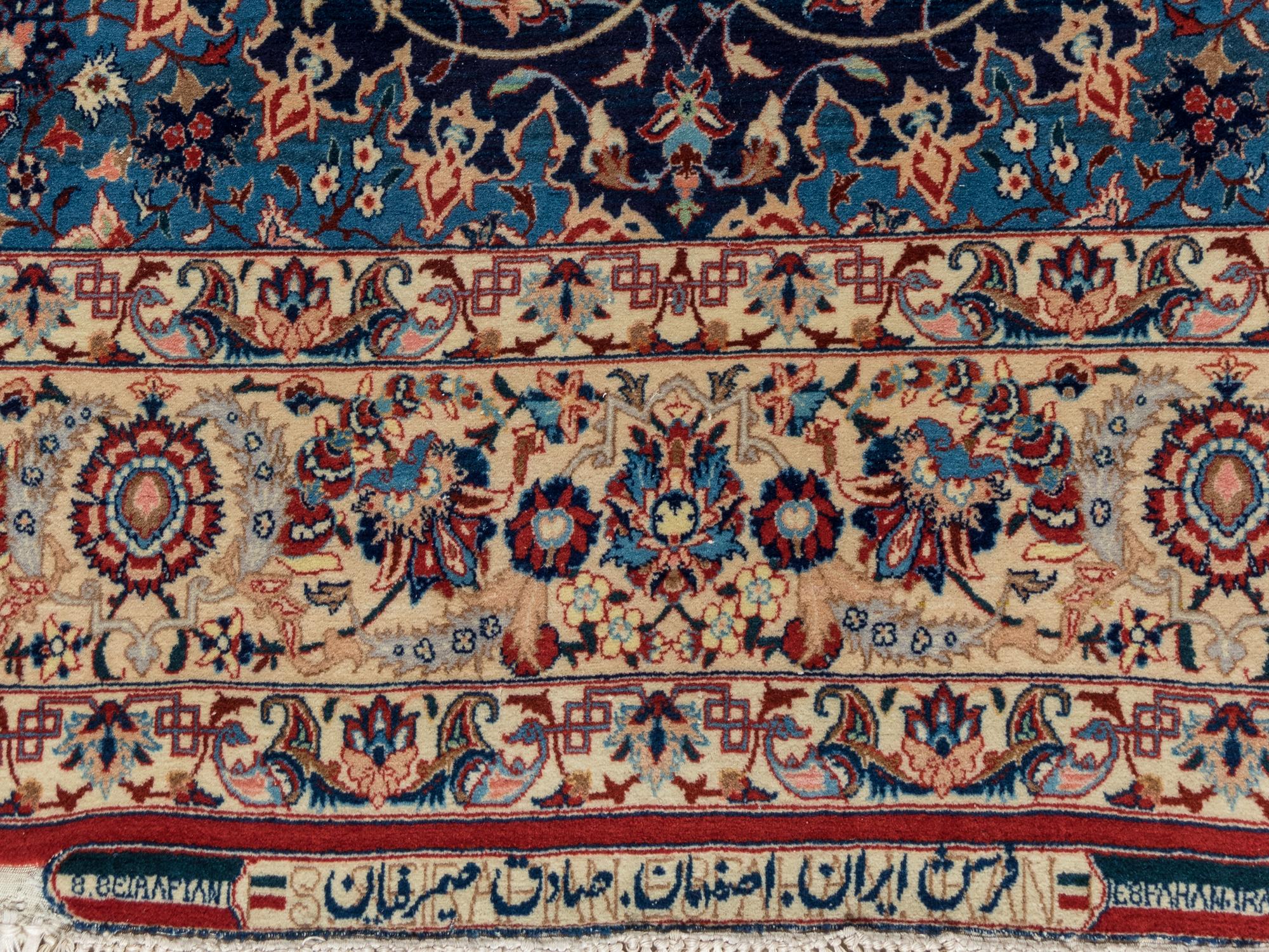 A Signed Isfahan Silk Rug