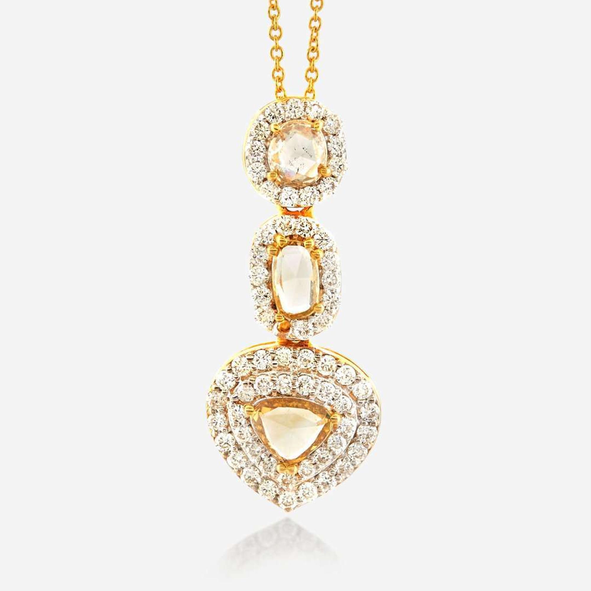 A diamond and gold pendant necklace