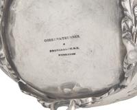 A Coin Silver Floral Repousse Covered Milk Jug and Covered Sugar Dish, Gorham Thurber (active 1850-1852), Providence, RI, 1850-1852