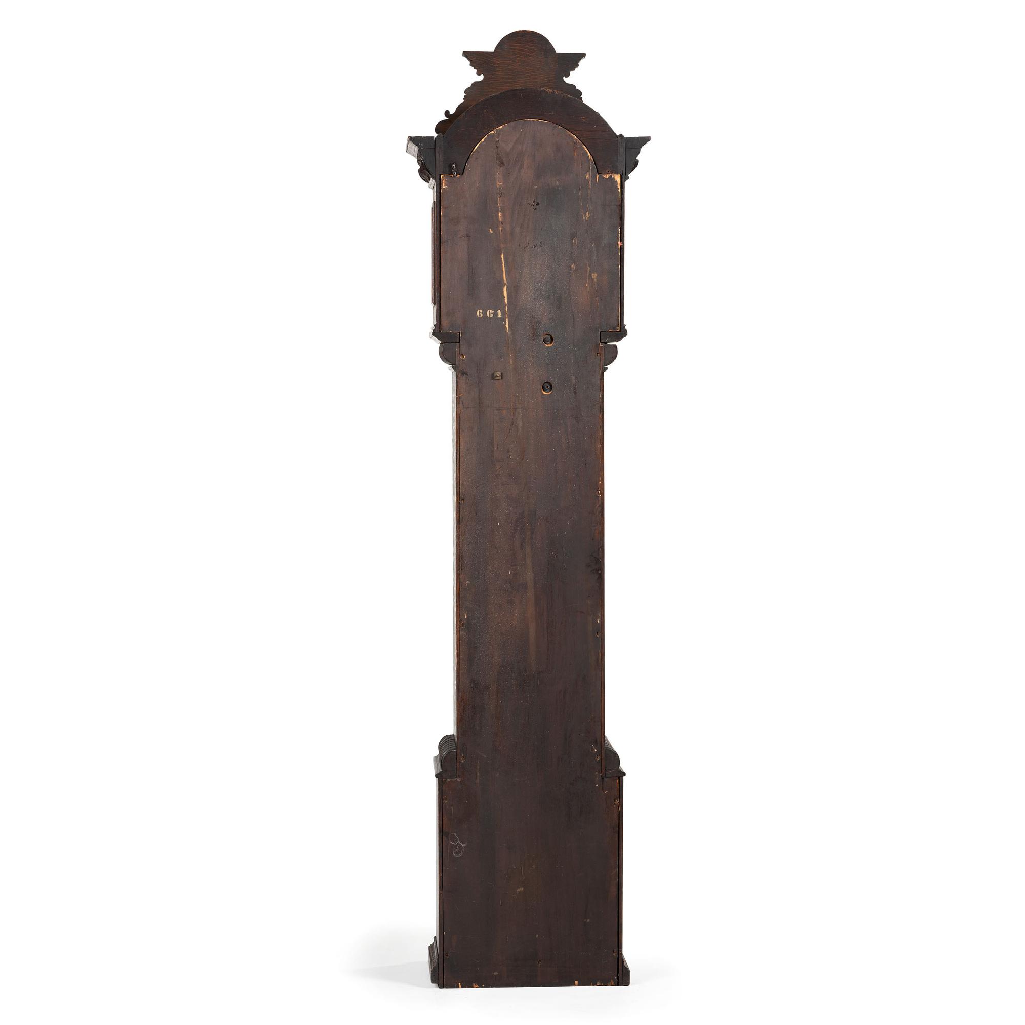 A Renaissance Revival Carved Oak Tall Case Clock