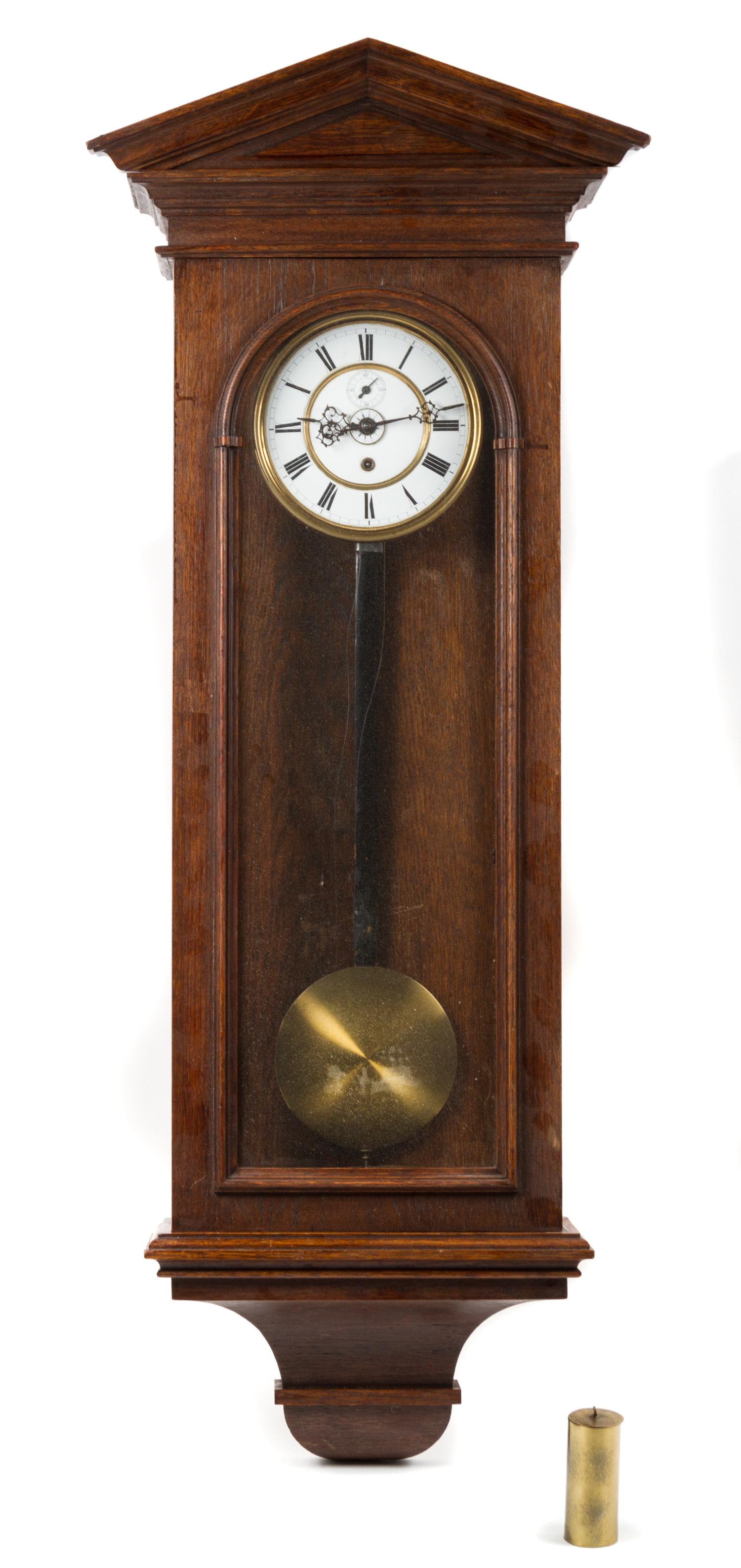A Gustav Becker Oak Regulator Clock Height 46 inches.