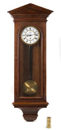 A Gustav Becker Oak Regulator Clock Height 46 inches.