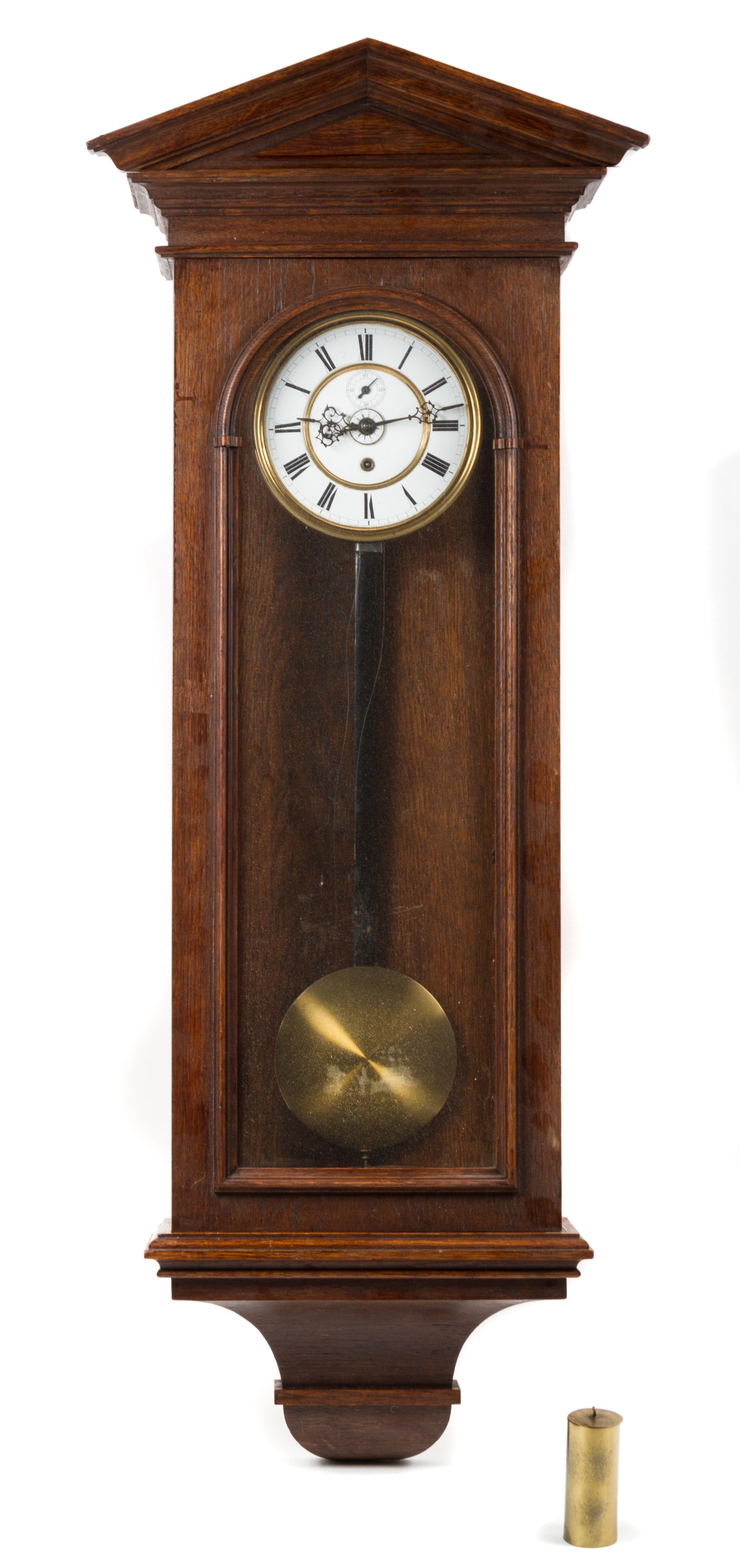 A Gustav Becker Oak Regulator Clock Height 46 inches.