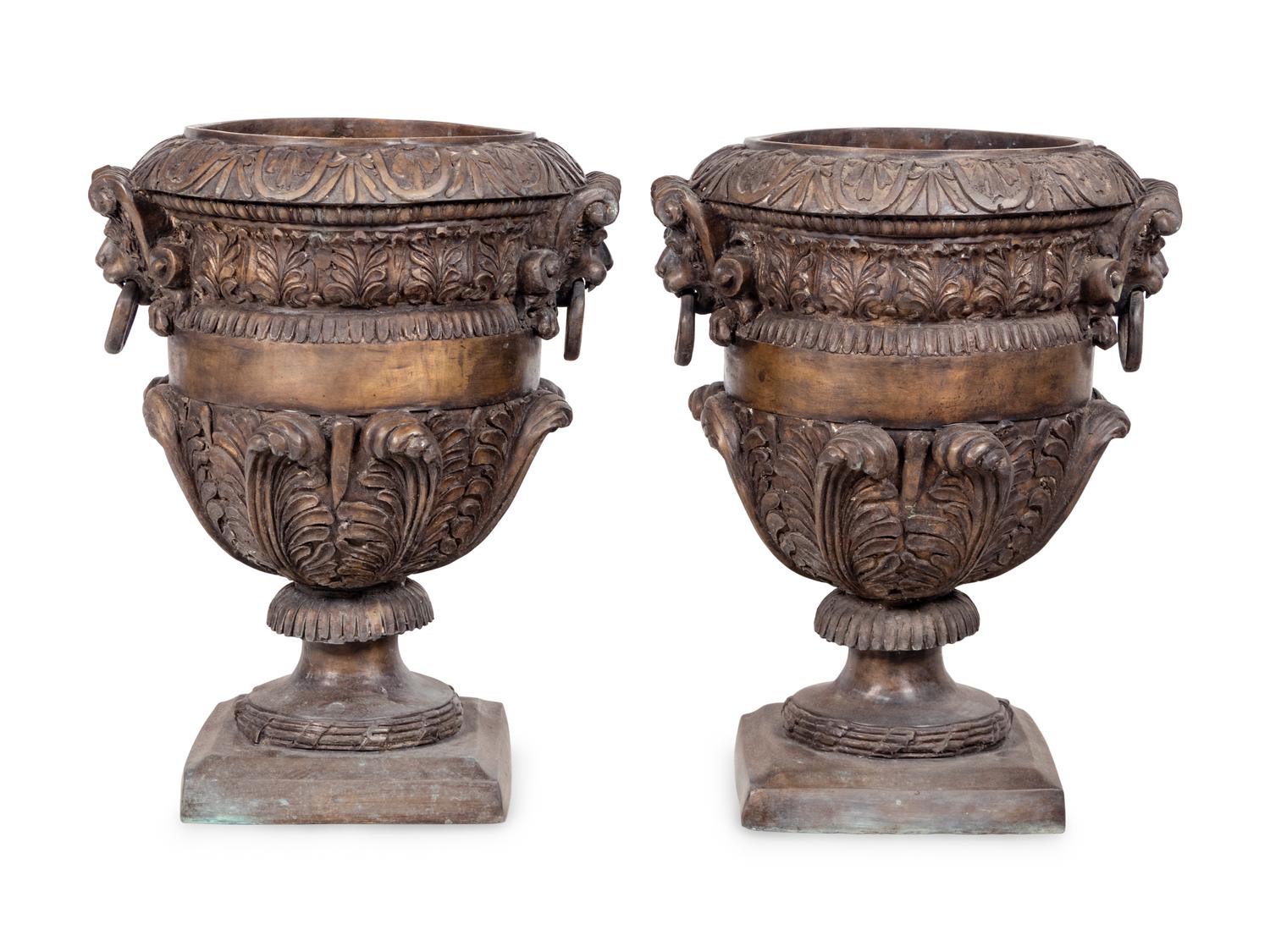 A Pair of Neoclassical Style Cast Metal Urns