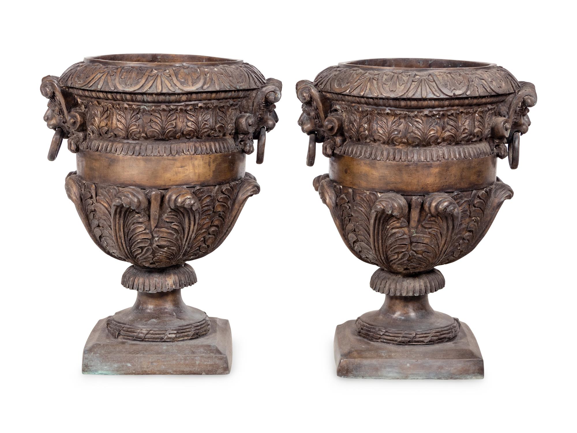 A Pair of Neoclassical Style Cast Metal Urns